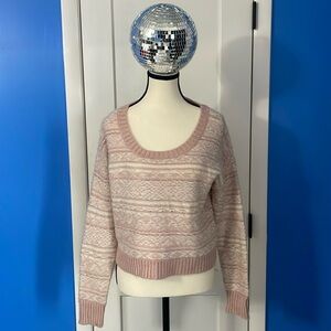 Cute Decree baby pink sweater can be worn as crop top or short sweater like.